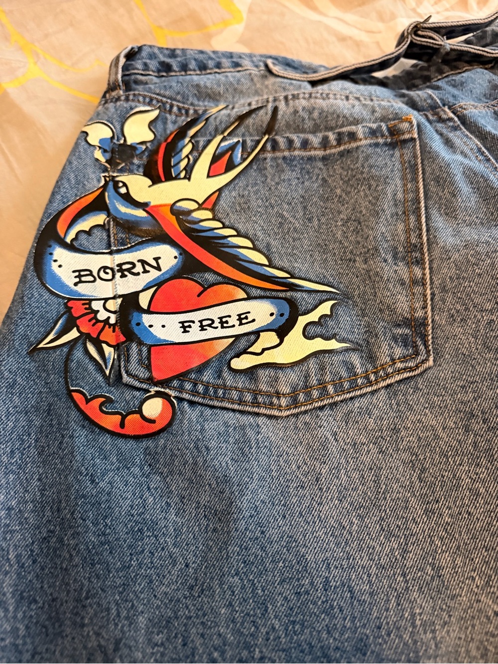 Ed Hardy Blue Denim Jeans with Bold Tattoo Pocket Art